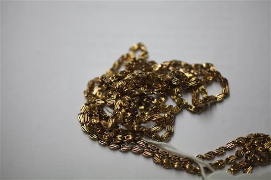 A late Victorian 9ct gold guard chain with gem set entwined serpent slide,